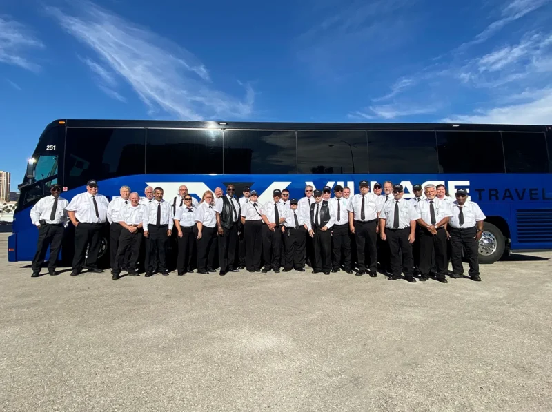 Professional motorcoach drivers at Village Travel